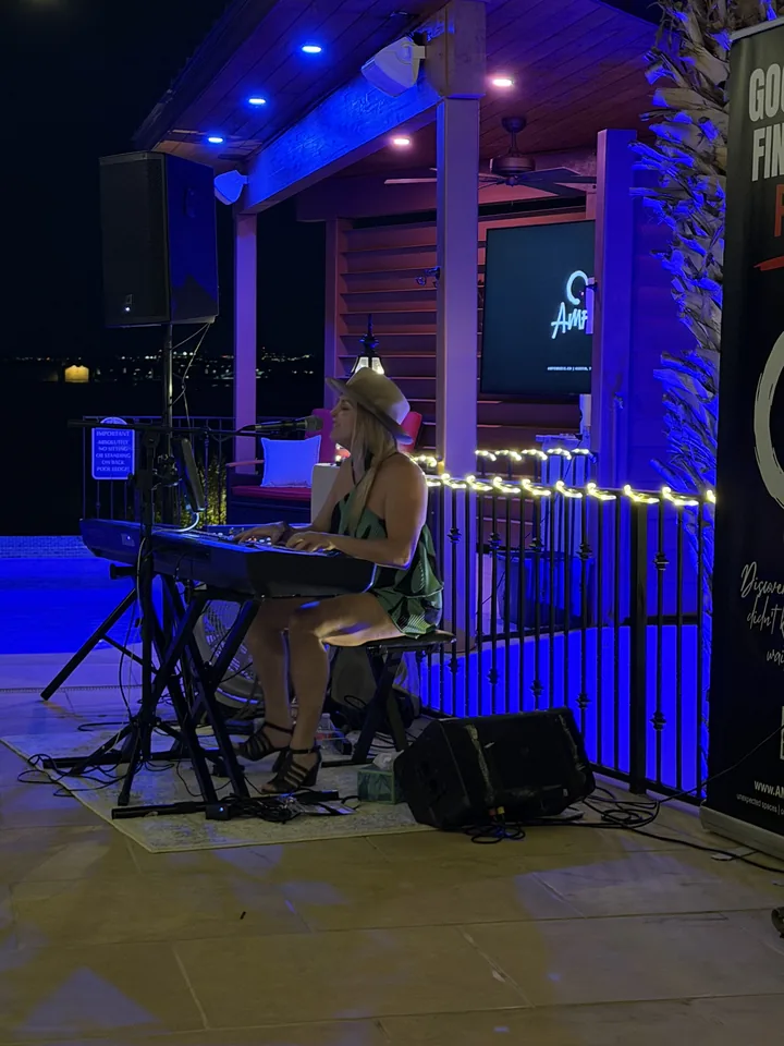 Keyboard player at an outdoor music gathering