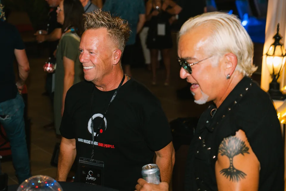 Guests sharing a conversation at the AMPD launch